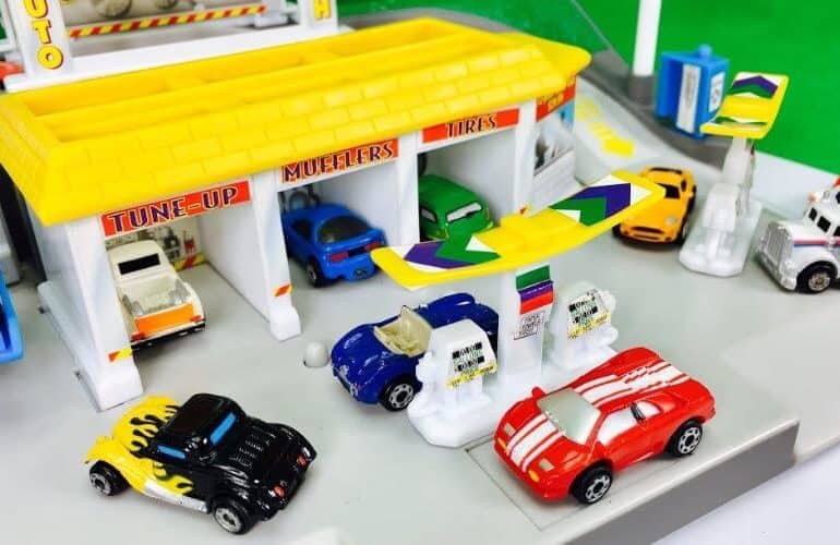 micro machines cars on a playset